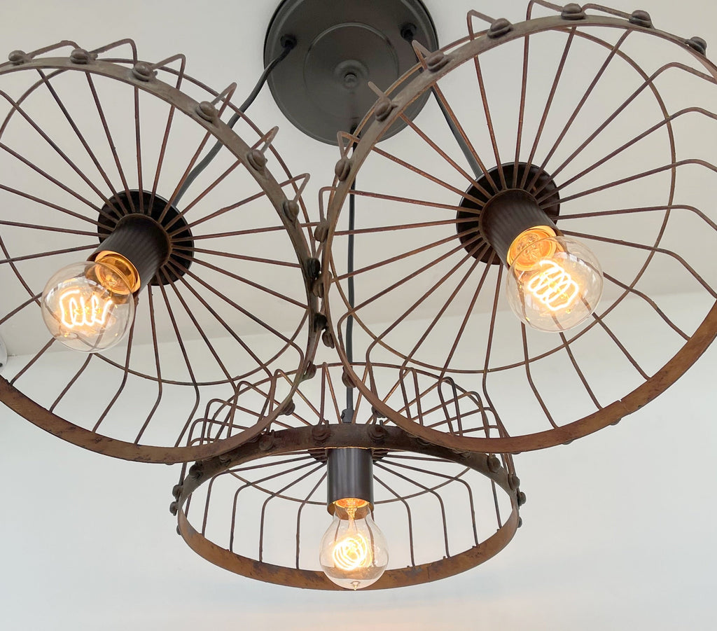 Rustic Wagon Wheel Industrial Three‑Light Chandelier