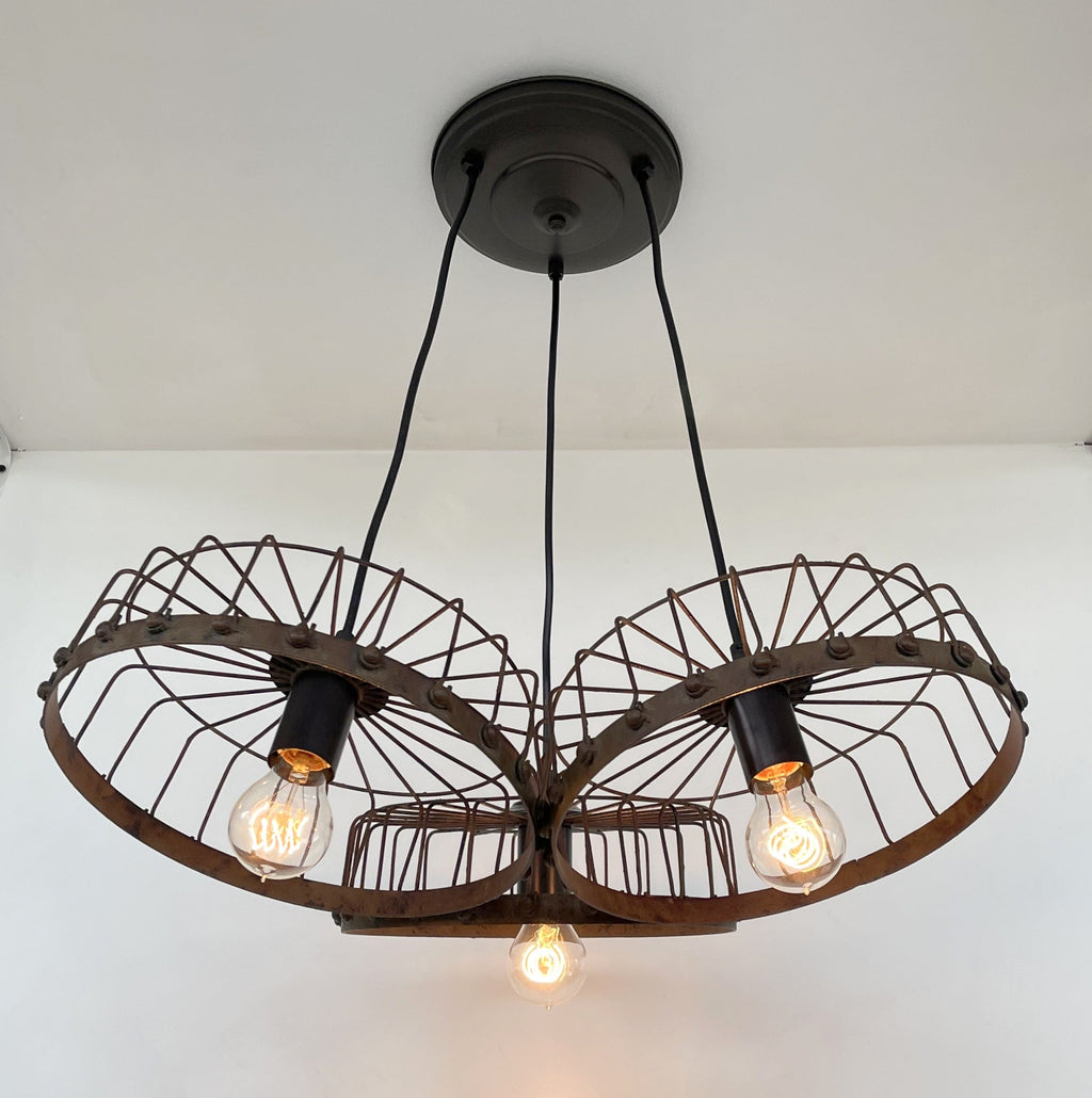 Rustic Wagon Wheel Industrial Three‑Light Chandelier