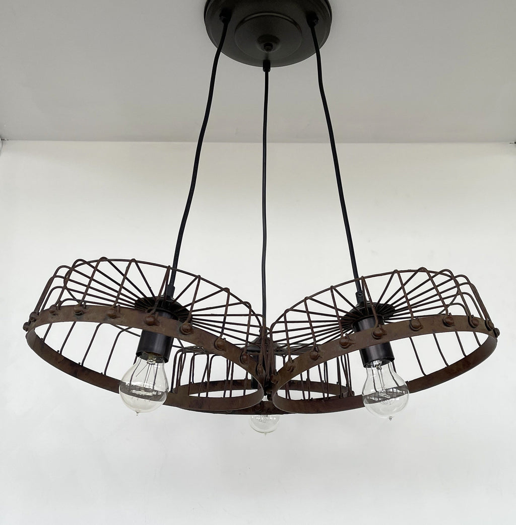 Rustic Wagon Wheel Industrial Three‑Light Chandelier
