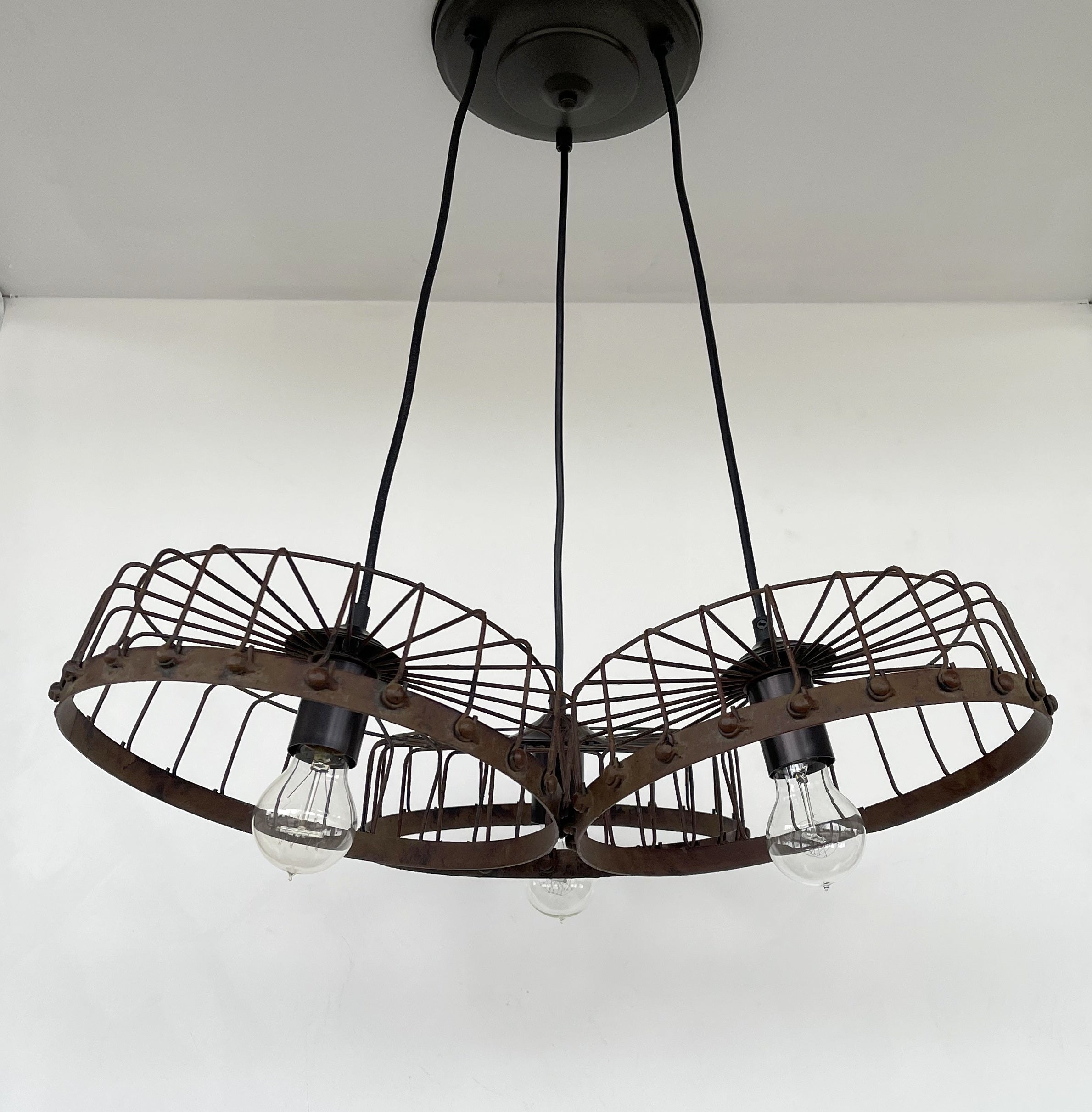 Rustic Wagon Wheel Industrial Three‑Light Chandelier