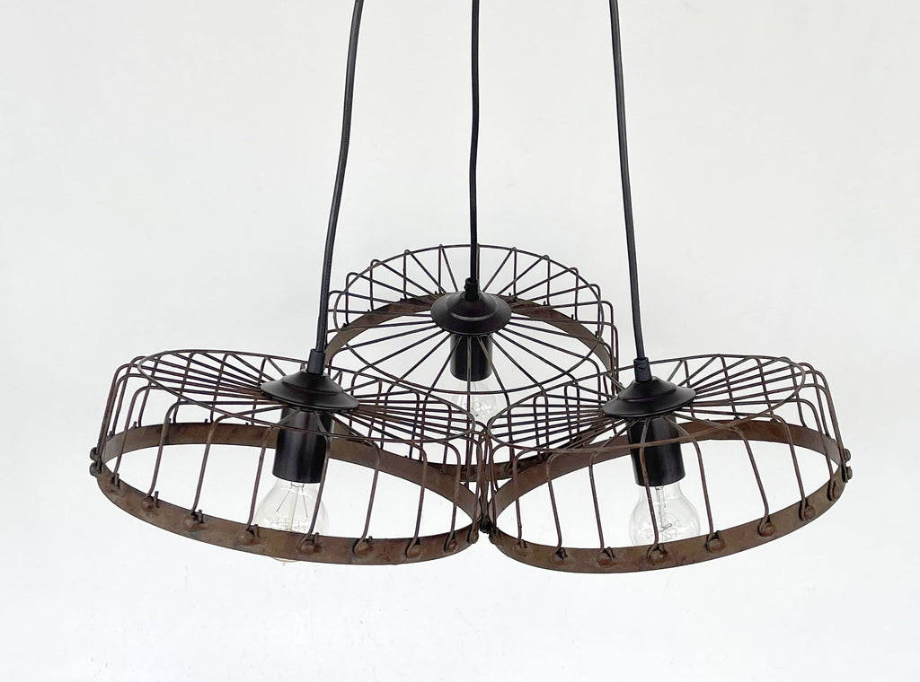 Rustic Wagon Wheel Industrial Three‑Light Chandelier