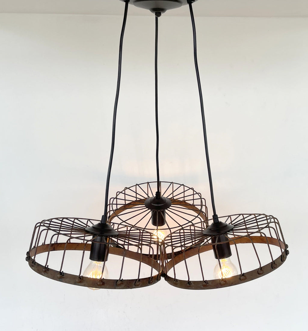 Rustic Wagon Wheel Industrial Three‑Light Chandelier