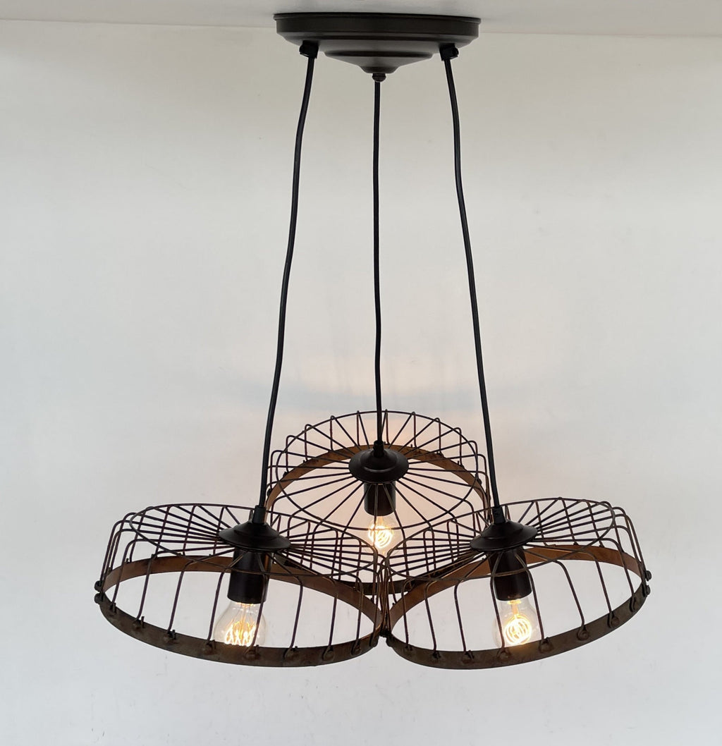 Rustic Wagon Wheel Industrial Three‑Light Chandelier