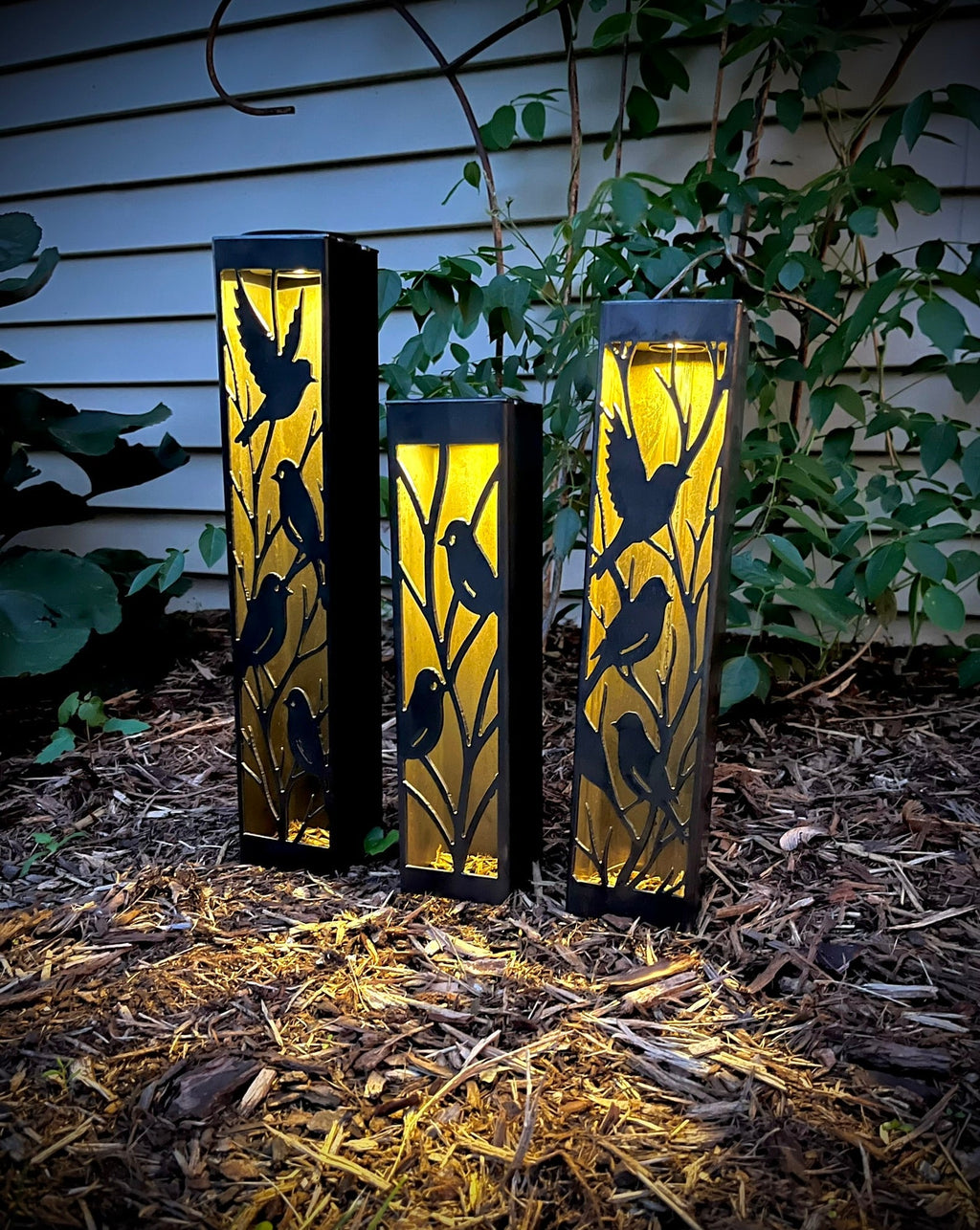 Evening Aviary Solar Luminary Pillars